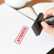 accredited stamp on papers