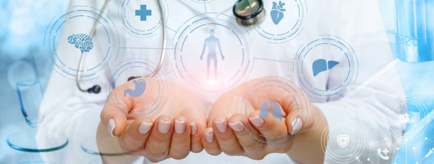 Dr holding diagram of patient info telehealth interoperability
